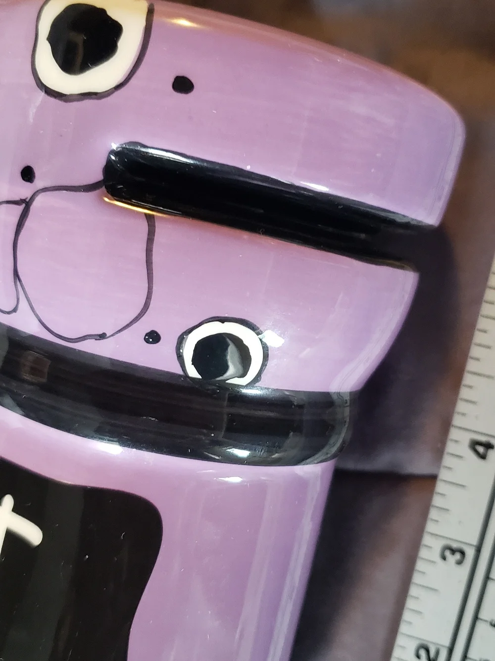 Lavender Ceramic Travel Mug with Playful Face and Black Accents Monogram L